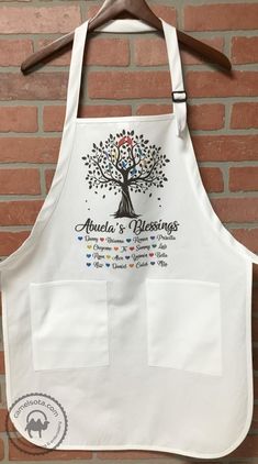 an apron hanging on a brick wall with the name and family tree printed on it