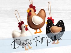 three felt chickens hanging from strings on a white wooden background with the words digital felt pattern