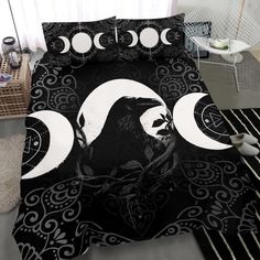 a bed with black and white designs on it