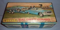 an old tin box with some cars on it