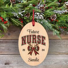 a wooden ornament with the words future nurse and an antelope on it