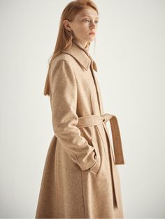 - A-line coat- Spread collar- Hidden button closure- Slant pocket at front- Strap detail at waist- Loose fit- Tonal stitchMeasurements(in.)- Shoulder 16.5, chest 19.7, sleeve 24.8, length 40.5* Model size: height 5'7, bust 31.8, waist 24.8, hip 34.6Composition & Care- 15% angora, 15% wool, 70% polyester- Dry cleaningDesigner- Imported- by HALEINE- Style#:300548929 Light Beige, Loose Fitting, Wool