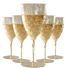 six champagne glasses are lined up in a row