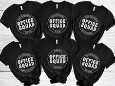 Unite your administrative squad with our Office Squad shirts, designed to foster team spirit and camaraderie in the workplace. These office team t-shirts are the perfect choice for your entire staff, providing a stylish and cohesive look while celebrating teamwork and dedication. Whether it's for daily wear or special team events, these group shirts make a thoughtful and meaningful gift for your hardworking administrative staff, showing appreciation for their invaluable contributions to the offi Black Team Spirit T-shirt With Branding, Custom Logo T-shirt For Team Events, Branded Short Sleeve T-shirt For Team Events, Cotton T-shirt With Branding For Team Events, Black Branded T-shirt For Team Events, Office Team, Office Staff, Team Events, Squad Shirt