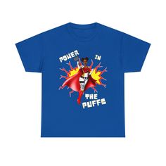 Not available in stores. Take your style to new heights with this Power in the Puffs tee. This unisex heavy cotton tee is perfect for anyone who wants to show off their superhero style. The shirt features a bold print of the iconic Afro Puff Superhero on the front, making it a must-have for any fan of Black Superheroines. Whether you're wearing it to the gym or out on the town, this tee is sure to turn heads and get you noticed. So power up and put your best foot forward in this stylish Superher Superhero Cotton Tops For Streetwear, Superhero Cotton T-shirt With Letter Print, Superhero Fashion, Afro Puff, Bold Prints, Fashion Tees, Heavy Cotton, Cotton Tee, Not Available