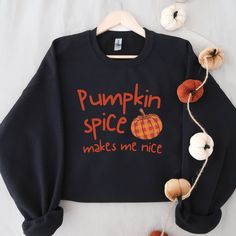 A cute pumpkin spice sweatshirt bound to keep you warm in the colder months. A pre-shrunk, classic fit sweater that's made with air-jet spun yarn for a soft feel and reduced pilling. * 50% cotton, 50% polyester * Pre-shrunk * Classic fit * 1x1 athletic rib knit collar with spandex * Air-jet spun yarn with a soft feel and reduced pilling * Double-needle stitched collar, shoulders, armholes, cuffs, and hem This pumpkin spice sweatshirt is made especially for you as soon as you place an order, which is why it sometimes takes us a bit longer to deliver it to you. Making products on demand instead of in bulk helps reduce overproduction, so thank you for making thoughtful purchasing decisions! Black Pre-shrunk Sweatshirt For Fall, Fall Sweatshirt With Letter Print And Comfortable Fit, Cozy Orange Crew Neck Top, Fall Cotton Orange Sweater, Fall Crew Neck Sweater With Comfortable Fit, Orange Crew Neck Sweatshirt For Fall, Pre-shrunk Relaxed Fit Fall Sweatshirt, Relaxed Fit Sweatshirt For Fall, Pre-shrunk Sweater For Fall Streetwear