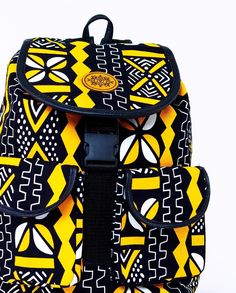 ANKARA MONKEY BACK-PACK. Whether you're seeking a leisure bag or a daily hardy everyday use back-pack this is it ! Handmade in Kenya from Ankara / Dashiki Cloth overlay on tough, hardy canvas fabric, it has two outside pockets and one zipper pocket inside.The top has a plastic buckle fastener and a drawstring to keep the items in the bag secure. A definite wardrobe must have! Overview: - Handmade item. Primary color:yellowMaterials: Canvas Fabric, Ankara cloth, Metalic zip enclosure Length: - 12 Yellow Backpack For Outdoor Activities And Back To School, Back To School Yellow Backpack For Outdoor Activities, Yellow Backpack For Outdoor Activities, Yellow Standard Backpack For Outdoor Activities, Yellow Backpack With Adjustable Strap For Back To School, Yellow Travel Backpack, Yellow Standard Backpack For Travel, Yellow Rectangular Backpack With Adjustable Strap, African Print Backpack