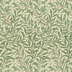 a green and white wallpaper with leaves on it