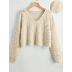 -Item Id 41645879 -Details: Rib-Knit -Sleeve Type: Drop Shoulder -Style: Casual -Hem Shaped: Regular -Color: Beige -Pattern Type: Plain -Neckline: V Neck -Sleeve Length: Long Sleeve -Length: Regular -Fit Type: Loose -Fabric: Non-Stretch -Material: Knitted Fabric -Composition: 97% Polyester, 3% Elastane -Care Instructions: Machine Wash Or Professional Dry Clean -Sheer: No **Open To Offers!!!** **Bundle To Save More** **30% Off Bundles Of 2 Or More Items!!** ***Orders Go Out Within 5-10 Business D Beige Cotton V-neck Knit Top, Beige Ribbed V-neck Top, Solid Color Knit V-neck Top, Beige Ribbed V-neck Sweater, Casual V-neck Knit Top With Ribbed Neckline, Beige Solid Color V-neck Top, Casual Ribbed V-neck Knit Top, Trendy Beige V-neck Knit Top, Beige Knit V-neck Top