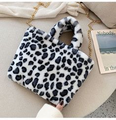 Brand Name: DKQWAITHandbags Type: Shoulder BagsTypes of bags: Shoulder Crossbody BagsMain Material: Faux FurLining Material: PolyesterShape: FLAPPlace Of Origin: GUANG DONG ProvinceOrigin: CN(Origin)Hardness: SoftPattern Type: LeopardInterior: Cell Phone PocketDecoration: NONEExterior: NONEOccasion: VersatileClosure Type: HaspGender: WOMENStyle: FashionModel Number: 465465Number of Handles/Straps: Single Groovy Accessories, Winter Handbag, Shoulder Bag Aesthetic, Female Leopard, Winter Handbags, Fur Animal, Leopard Tote, Leopard Bag, Perfect Gift For Girlfriend