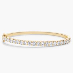 Add gorgeous gleam to your wrist with this round bangle bracelet crafted from warmly lustrous 14k yellow gold. Brilliant lab-grown diamonds encircle the bracelet, adding sparkling luxury. Pave Bangle, Blue Nile, Diamond Fashion, Pave Diamonds, Bangle Bracelet, Fashion Bracelets, Lab Grown, Lab Grown Diamonds, Bangle Bracelets