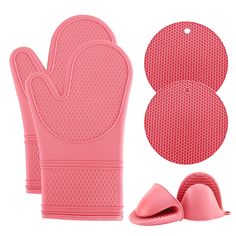 two oven mitts, one in pink and the other in red with an oven mitt