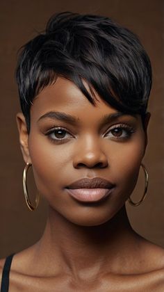 Discover the modern edge of a sleek high undercut, perfect for Black women. This stylish haircut combines a high undercut with natural curls, creating a chic and contemporary look. Visit our site for styling tips and inspiration. Save this pin for your next sleek high undercut! #Undercut #ShortHair #BlackWomen #SleekStyle #ModernEdge High Undercut, Curly Hair Shaved Side, Black Women Short Hairstyles, Pixie Crop, Short Sassy Haircuts