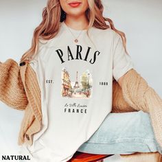 This Paris, France Eiffel Tower shirt is super soft and cozy. Perfect to lounge around, run errands, or walk your dog. ABOUT THIS SHIRT   ∙ Shirt is UNISEX and runs slightly large for ladies (For a relaxed fit, I suggest your usual size. For an oversized fit, I suggest sizing up 1 to 2 sizes.) ∙ Solid Colors: 100% airlume ringspun cotton, Dark Grey Heather: 52% cotton, 48% polyester, Athletic Heather 90% cotton, 10% polyester ∙ Colors may vary based on your monitor/screen display or lighting CAR Swiss Clothing, Italy Shirt, French Gifts, Paris Shirt, French Outfit, Travel Tees, Clothes Gift, Amalfi, Prague