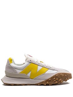 grey/white/yellow suede panelled design logo patch to the side round toe front lace-up fastening logo-print tongue rubber sole These styles are supplied by a premium sneaker marketplace. Stocking only the most sought-after footwear, they source and curate some of the most hard to find sneakers from around the world. New Balance Xc 72, Shoe Goals, Nyc Hotels, Shop Till You Drop, New Balance Sneakers, Sneakers Blue, Low Top Sneakers, New Balance Shoes, Suede Sneakers