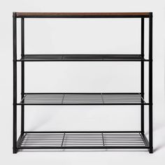 a black metal shelf with three shelves on each side and one shelf below the shelf