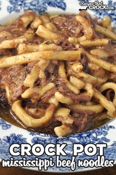 crock pot mississippi beef noodles on a blue and white plate