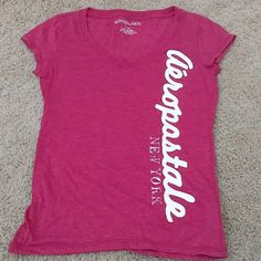 Red V - Neck With Aeropostale Logo In White Sequin. New York Lettering Printed In Distressed Silver Color. Capped Short Sleeves. New Without Tag. Never Worn. Emo Angel, Aeropostale Logo, Thrift Ideas, Vintage Hollister, Trashy Y2k, Fancy Dresses, V Neck Tops, Dream Wardrobe, Aeropostale