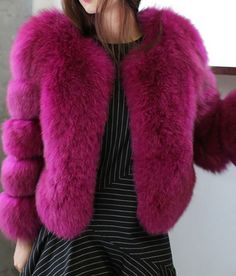 This purple fur jacket is made of a very thick fur that will keep you warn very well. This purple fur jacket will make you look very feminine. The features of this winter coat are the following: thick fur, faux fur, for winter and autumn, purple color.