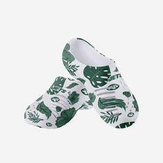 When you're packing for your next beach trip, make sure your team spirit isn't left at home. These New York Jets Women's Floral White Clogs have you covered! Features All-over team-colored, floral design so you can rep the team in style Repeat team logo displays, in case there were any doubts where your allegiances lie Wordmark name display on each for a little extra team spirit Roomy, comfortable fit to help you enjoy every step Ventilation gaps for maximum breathability Versatile, lightweight