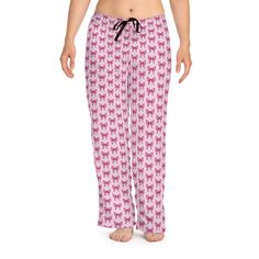 Cute and coquette back to school pajama pants with a bow and pencil print, perfect for lounging and relaxing. Ideal for girls who love fun and whimsical designs. Perfect for back-to-school season and casual loungewear occasions. Product features - 100% polyester jersey for a soft and bright print - Double needle stitching for durability - Adjustable drawstring waist for the perfect fit - All over print covers entire product - Lightweight fabric for relaxed comfort fit Care instructions - Do not dryclean - Do not iron - Tumble dry: low heat - Do not bleach - Machine wash: cold (max 30C or 90F) Purple Cotton Pants For Pajama Party, Casual Purple Pants For Pajama Party, Cute Pink Bedtime Pants, Cute Cotton Bedtime Pants, Purple Pants For Pajama Party, Casual Purple Sleep Pants, Purple Cotton Bottoms For Pajama Party, Cute Lounge, Pants Cute