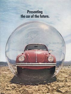 a red car in a glass ball with the words presenting the car of the future