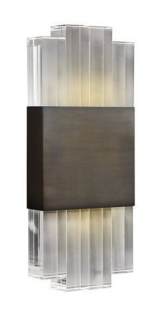 a modern wall light that is made out of acrylic glass and has a rectangular shape