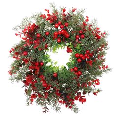 a christmas wreath with red berries and green leaves