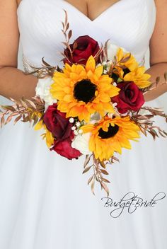 a bride holding a bouquet of sunflowers and roses