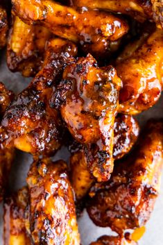 chicken wings with bbq sauce on them