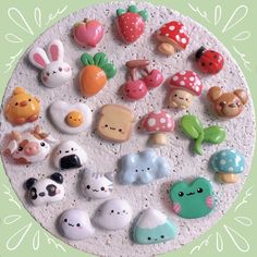 there are many different toy animals on this plate