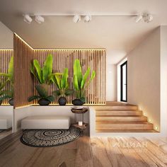 a living room filled with lots of plants next to a white couch and wooden stairs