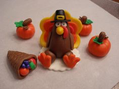 a cake decorated like a turkey and some candy