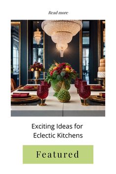 Elegant table setting with red glassware and floral centerpiece beneath opulent chandeliers in a modern kitchen.