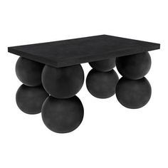 a black table that has some balls on the top and bottom, along with two legs