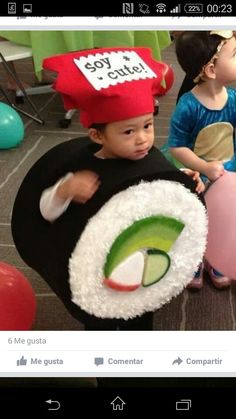 two children dressed up as sushi and avocado in costumes for an event