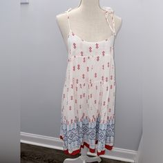 Look No Further- I Have Found The Perfect Fourth Of July Dress! It’s So Lightweight And Has Your Red White And Blue Without Just Slapping A Flag On It. It Has Straps That You Can Adjust (They Tie) And Look So Cute When You Tie Them In Bows. Perfect With A Jean Jacket Or Just Throwing On Some Sandals. It’s New Without Tags, Just Been Sitting In My Closet Storage. Summer Patterned Dresses For Daywear, Summer Patterned Day Dresses, Summer Daywear Dresses In Patterned Color, Sleeveless Printed Mini Dress For Daywear, Daytime Sundress With Tie Back, Bohemian Tie-back Dress For Daywear, Bohemian Tie Back Dress For Daywear, White Bohemian Sundress With Tie Back, Bohemian Sleeveless Mini Dress For Daytime