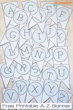 the printable alphabets are all cut out and placed on top of each other