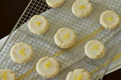 lemon cookies are cooling on a wire rack