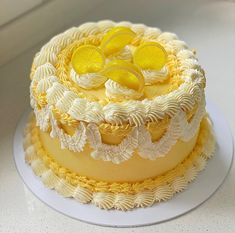 there is a cake with lemons on it