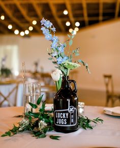 Wedding Growler Centerpiece, Brewery Party Decor, Brewery Wedding Centerpieces, Growler Centerpiece Wedding, Growler Decor, Growler Centerpiece, Masculine Centerpieces, Beer Bottle Centerpieces, Round Table Centerpieces Wedding