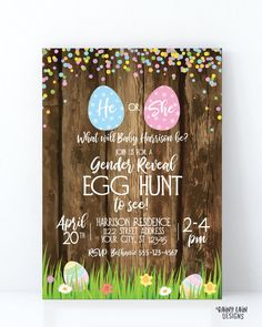 an easter egg hunt is on display in front of a wooden fence