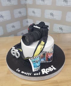 a birthday cake made to look like a camera