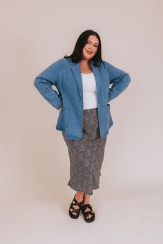 Step up your fashion game with our PLUS SIZE 'Don't Think About It' jacket. This medium wash denim blazer features a front button closure and seam detailing throughout, adding a touch of sophistication to any outfit. Don't think twice, this jacket is a must-have! Details Medium wash soft denim fabrication Pockets Seam detailing throughout Lapel collar Relaxed fit Sizing *Measurements are taken unstretched with item hanging* Approximate measurements: SIZE LENGTH BUST 1XL 30” 46” 2XL 30” 50” 3XL 3 Nursing Friendly Tops, Nursing Friendly Dress, Plus Jumpsuit, Exclusive Dress, Denim Blazer, Think About It, Maternity Shops, Basic Dress, Tank Top Long Sleeve