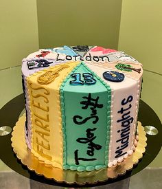 a decorated birthday cake on a glass table