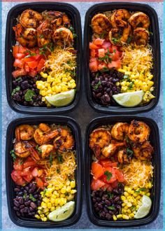 four trays filled with shrimp, black beans, corn, and tomatoes on top of each other