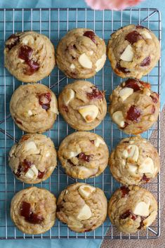 a cooling rack filled with cookies on top of a table