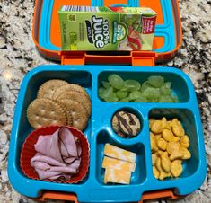 an open lunch box with food in it