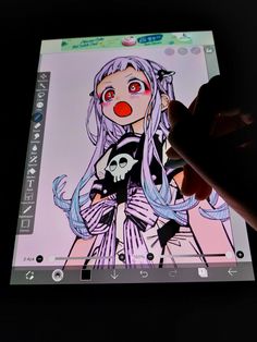 someone is drawing an anime character on their tablet screen while holding it up to the camera