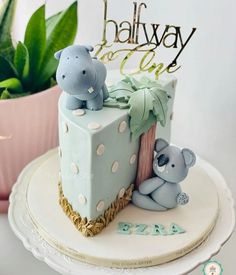 there is a cake that has two animals on it